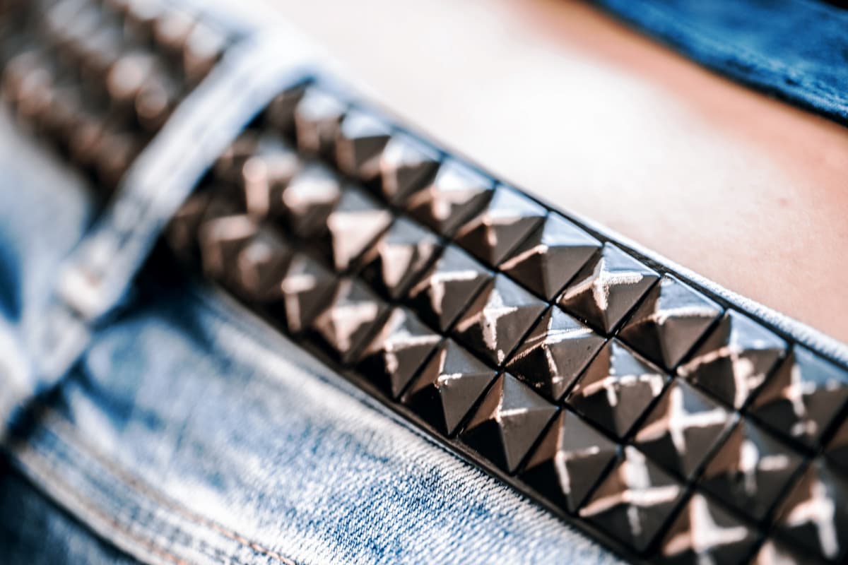 Wide studded belt.